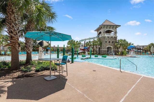 pool with a patio