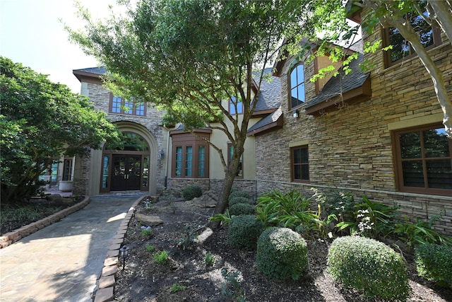 view of front facade featuring stone siding