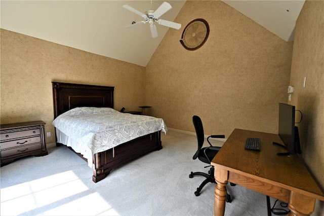 carpeted bedroom featuring a ceiling fan and high vaulted ceiling