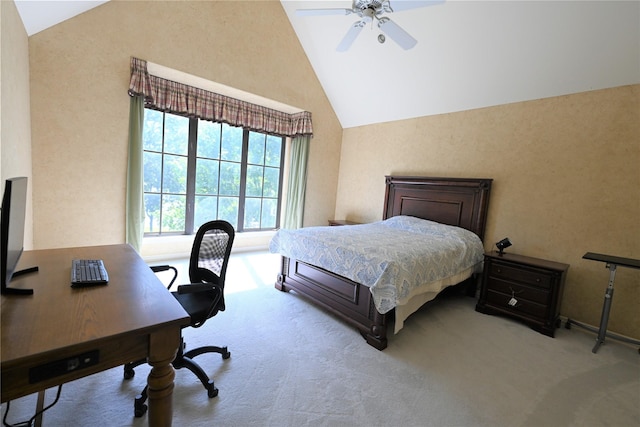 carpeted bedroom featuring ceiling fan and high vaulted ceiling