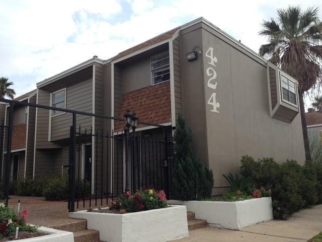 view of home's exterior with brick siding