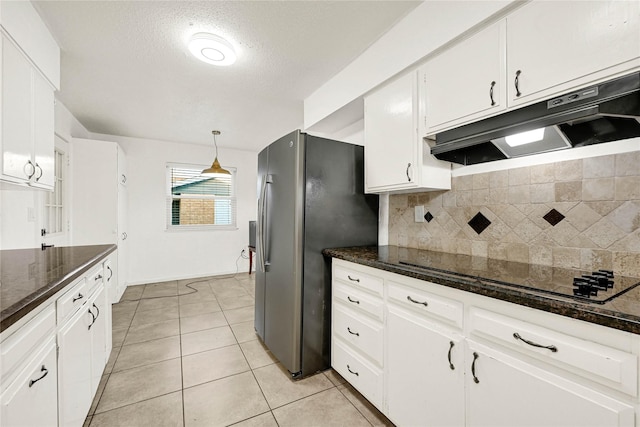 kitchen featuring under cabinet range hood, white cabinetry, black electric cooktop, and stainless steel refrigerator with ice dispenser