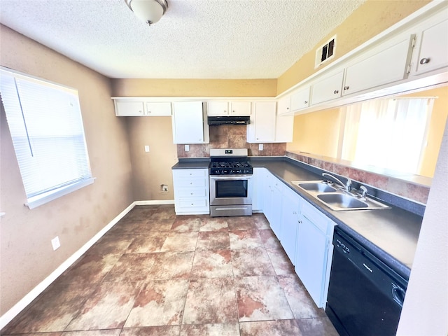 kitchen featuring visible vents, dishwasher, stainless steel gas range, under cabinet range hood, and a sink