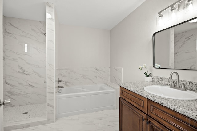 full bath with marble finish floor, a walk in shower, a bath, and vanity