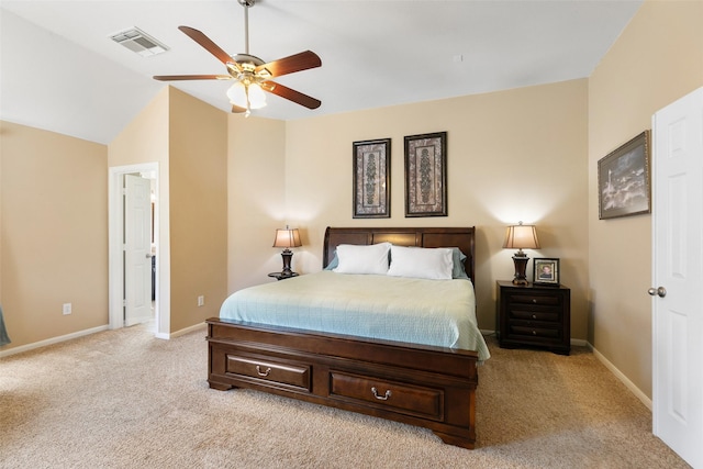 bedroom featuring light carpet, baseboards, visible vents, a ceiling fan, and lofted ceiling