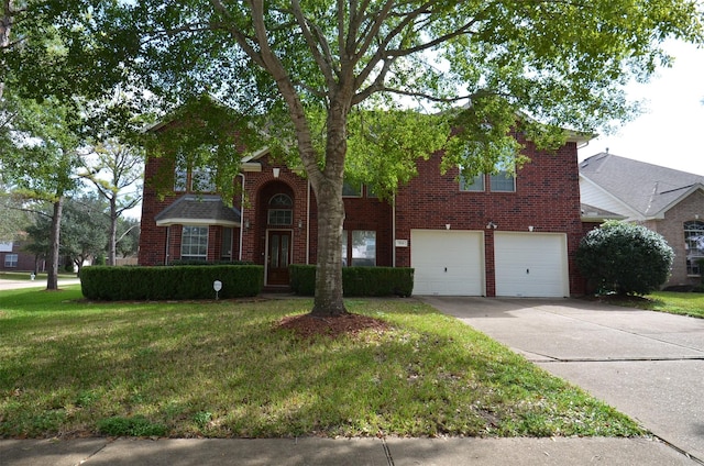 view of front of property featuring brick siding, an attached garage, concrete driveway, and a front yard