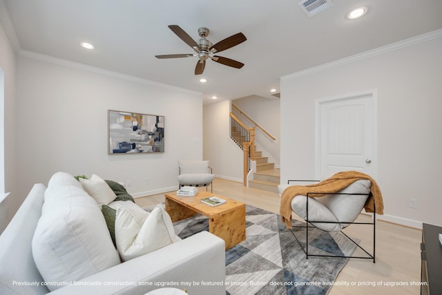 living room with recessed lighting, visible vents, stairway, light wood finished floors, and crown molding