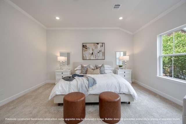 bedroom with lofted ceiling, light colored carpet, visible vents, ornamental molding, and baseboards