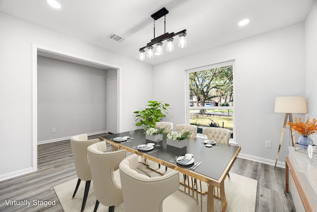 dining space featuring recessed lighting, wood finished floors, visible vents, and baseboards