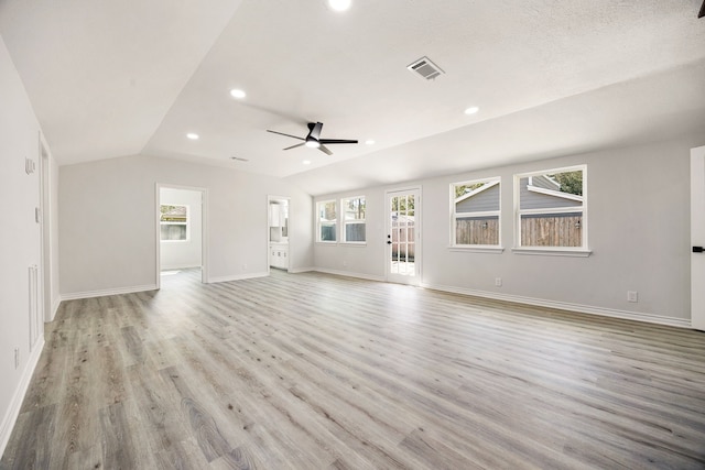 unfurnished living room with recessed lighting, baseboards, visible vents, and light wood finished floors