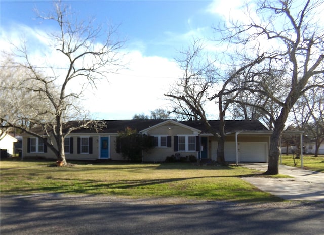 ranch-style house featuring concrete driveway, a front lawn, and an attached garage