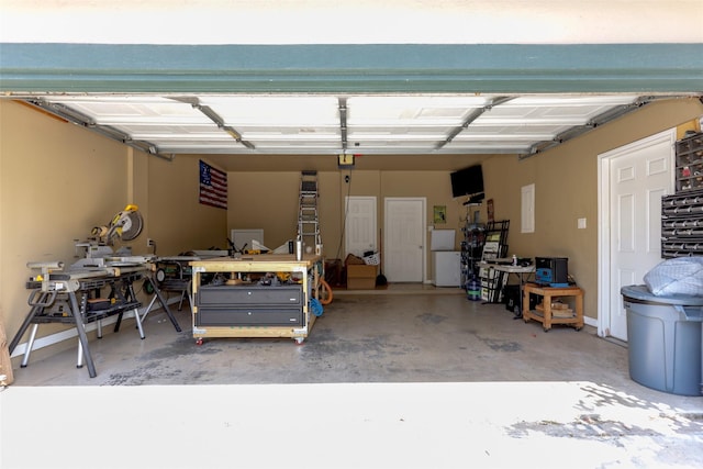 garage featuring a workshop area