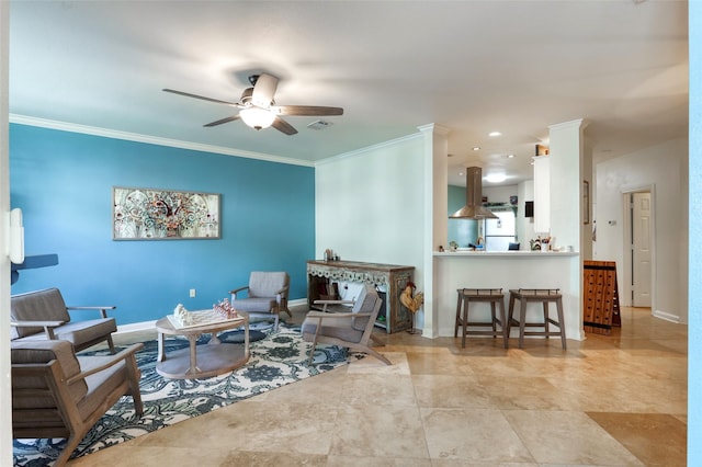 living area with a ceiling fan, visible vents, crown molding, and baseboards