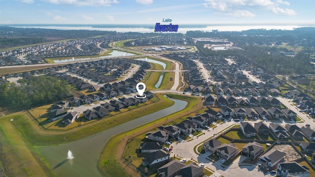 aerial view featuring a residential view and a water view