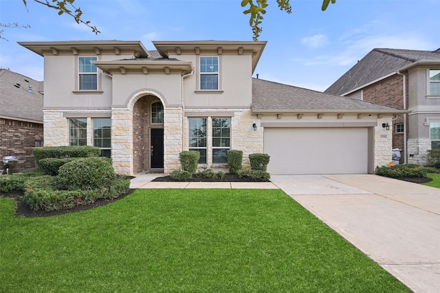 view of front facade with driveway, stone siding, stucco siding, an attached garage, and a front yard