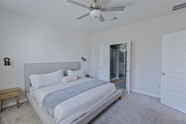 bedroom featuring baseboards, visible vents, a ceiling fan, and light colored carpet