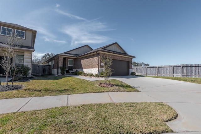 view of front of house with a garage, fence, driveway, a front lawn, and board and batten siding