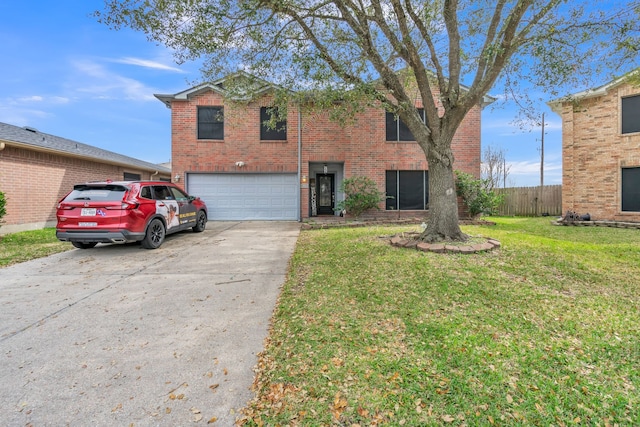 traditional-style home featuring concrete driveway, an attached garage, fence, a front lawn, and brick siding