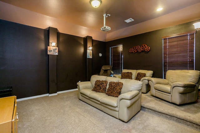 carpeted cinema room featuring recessed lighting, visible vents, and baseboards