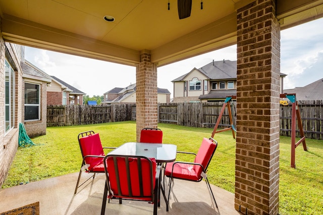 view of patio featuring outdoor dining area and a fenced backyard