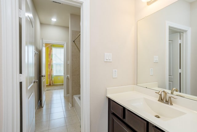 full bathroom featuring shower / tub combination, vanity, and tile patterned floors