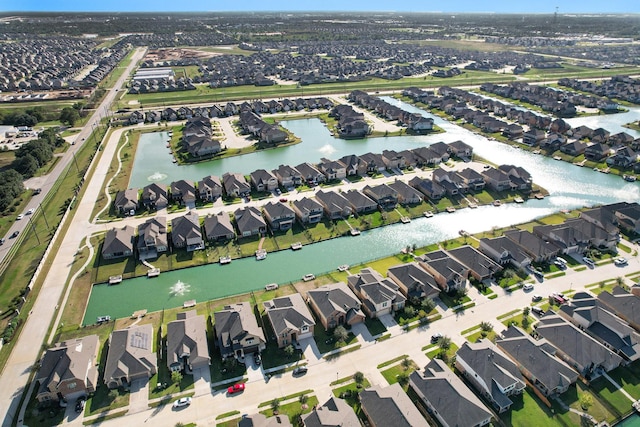 aerial view with a residential view and a water view