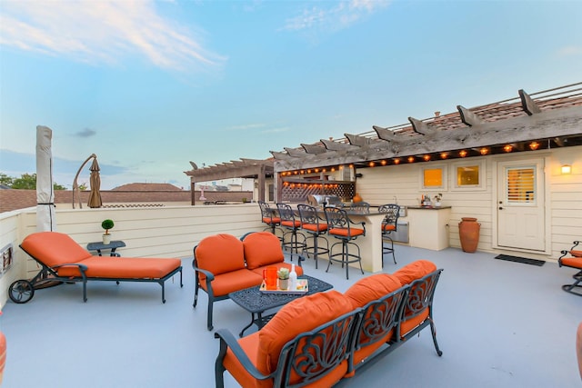 view of patio / terrace featuring an outdoor hangout area, outdoor dry bar, and a pergola