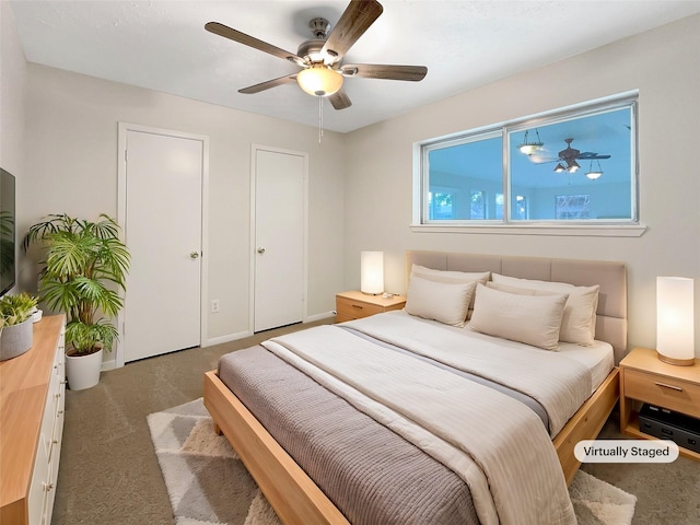 bedroom with carpet, a ceiling fan, and baseboards