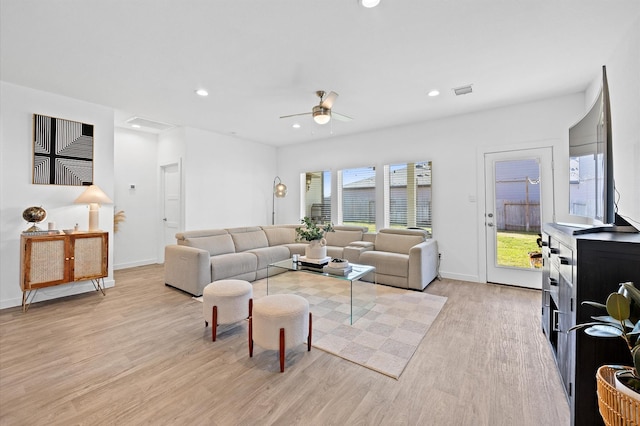 living room with light wood-style flooring, recessed lighting, baseboards, and ceiling fan