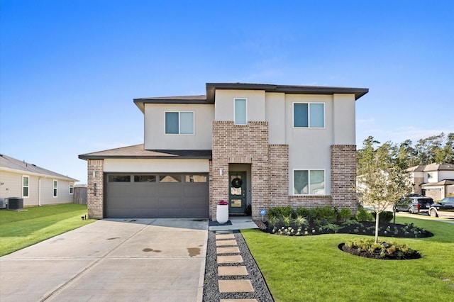 view of front facade with brick siding, stucco siding, a front yard, and central AC