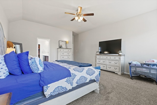 bedroom with ensuite bathroom, a ceiling fan, lofted ceiling, and carpet