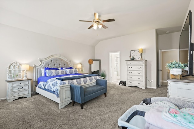 carpeted bedroom with vaulted ceiling, a ceiling fan, baseboards, and connected bathroom