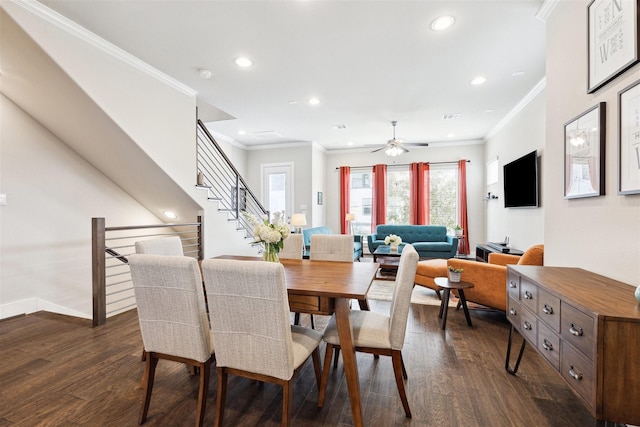 dining space featuring dark wood-style floors, ornamental molding, baseboards, and recessed lighting