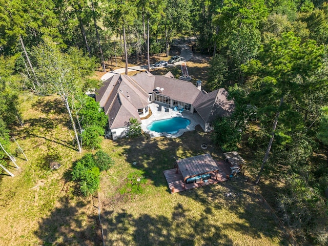 bird's eye view with a forest view