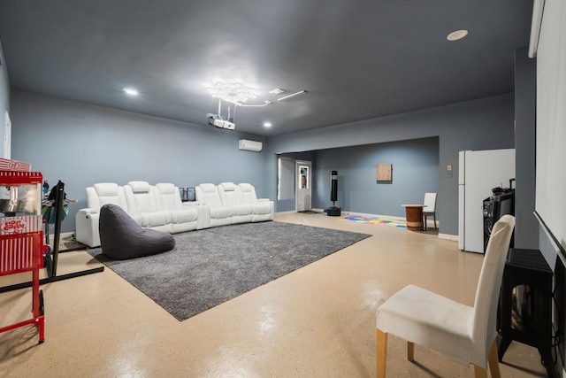 living room with an AC wall unit, concrete floors, recessed lighting, and baseboards