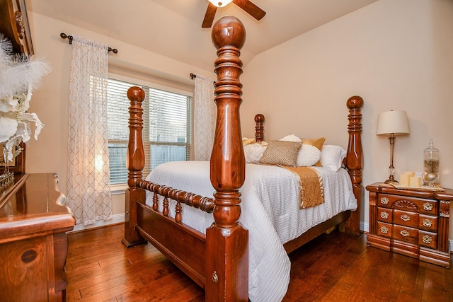 bedroom with baseboards and hardwood / wood-style floors