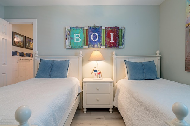 bedroom with light wood-style flooring