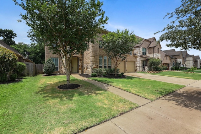 view of front of home featuring driveway, stone siding, fence, a front lawn, and brick siding