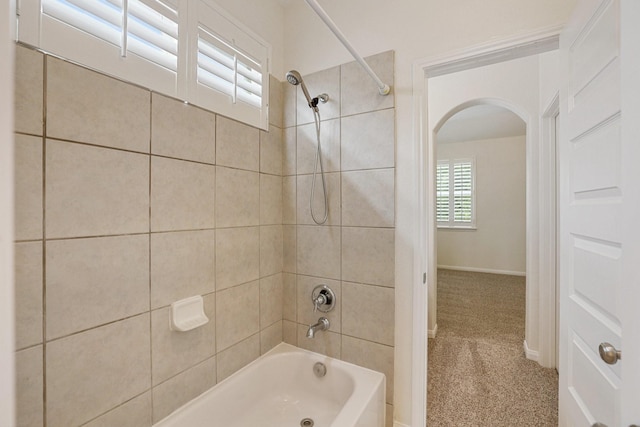 bathroom with shower / tub combination