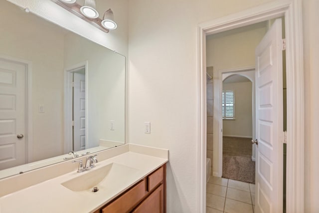 bathroom featuring tile patterned flooring and vanity