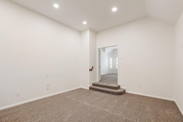 empty room with carpet, baseboards, and recessed lighting