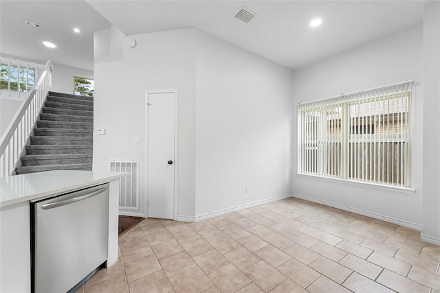 interior space with stairway, light tile patterned floors, visible vents, and recessed lighting