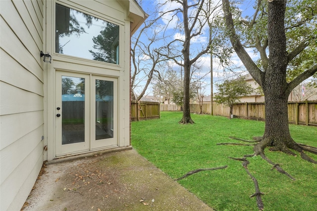 view of yard with a fenced backyard