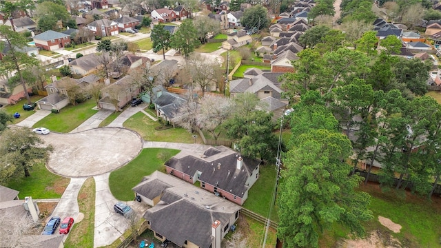 birds eye view of property with a residential view