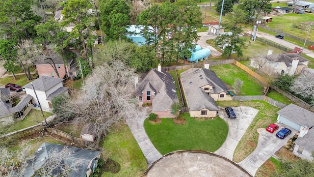 birds eye view of property with a residential view