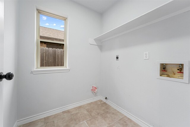 laundry room with light tile patterned floors, hookup for a washing machine, laundry area, baseboards, and electric dryer hookup