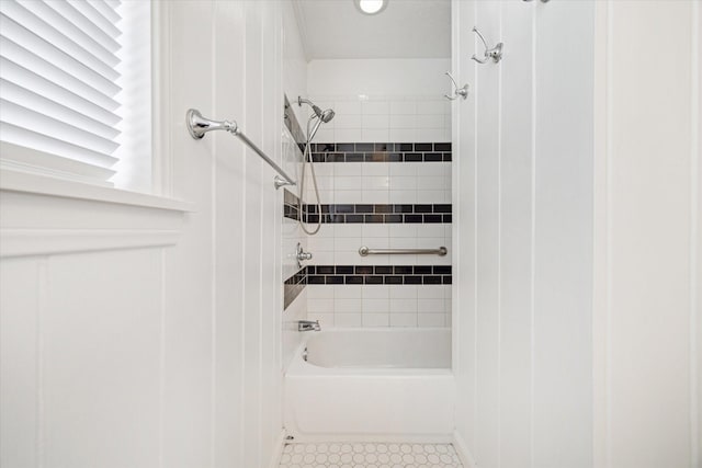 bathroom with shower / washtub combination and tile patterned flooring