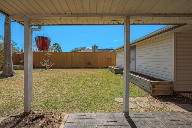 view of yard with a fenced backyard