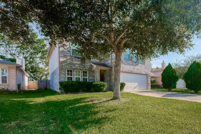 view of front facade featuring a front yard, fence, a garage, stone siding, and driveway