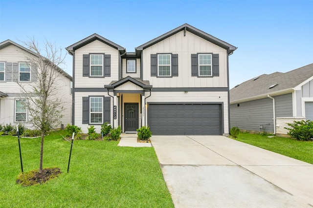 view of front of home with an attached garage, a front yard, board and batten siding, and concrete driveway